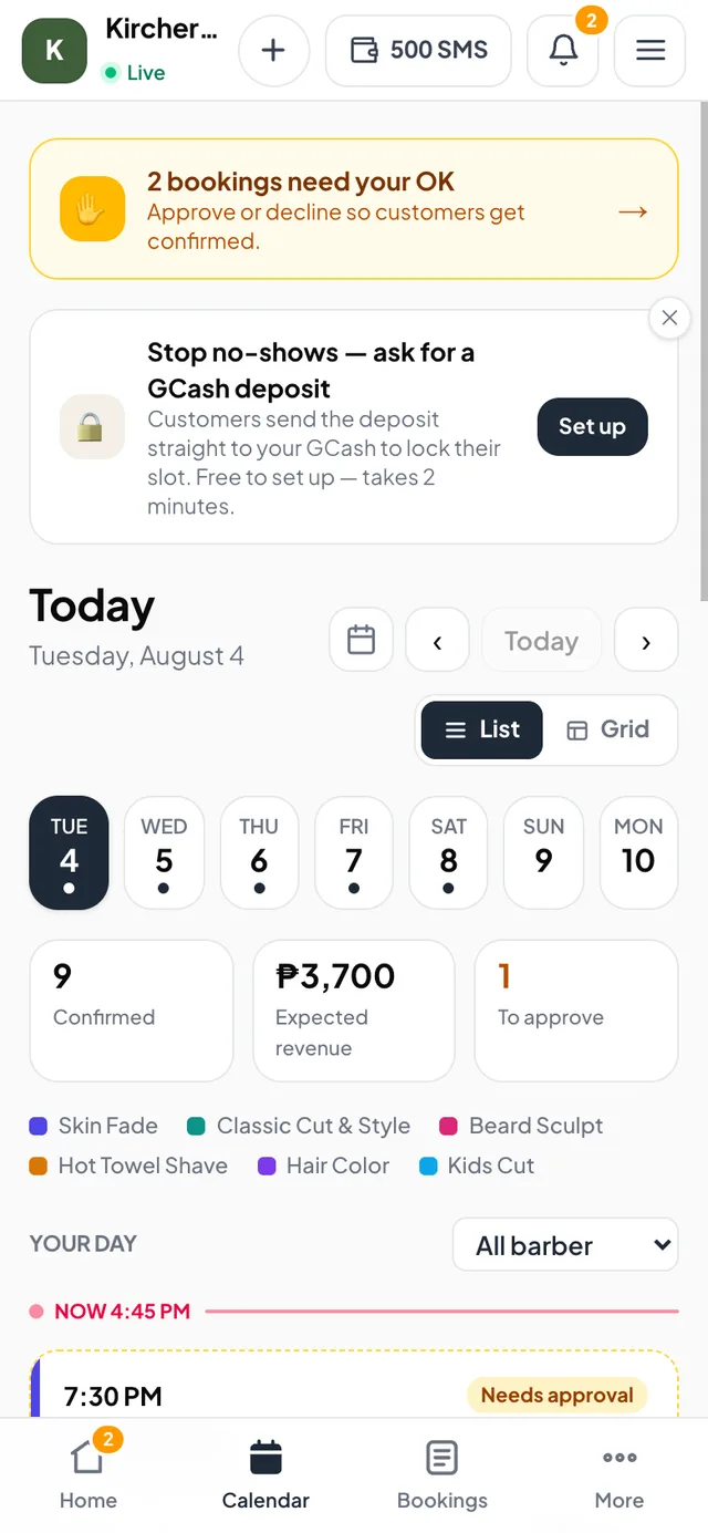 The owner calendar — day view with confirmed revenue, approvals, and each barber's schedule